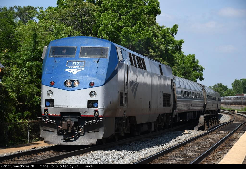 Westbound "Regional" approaches the station